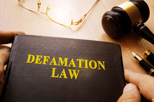 Image of a book of defamation law to determine whether you can sue.