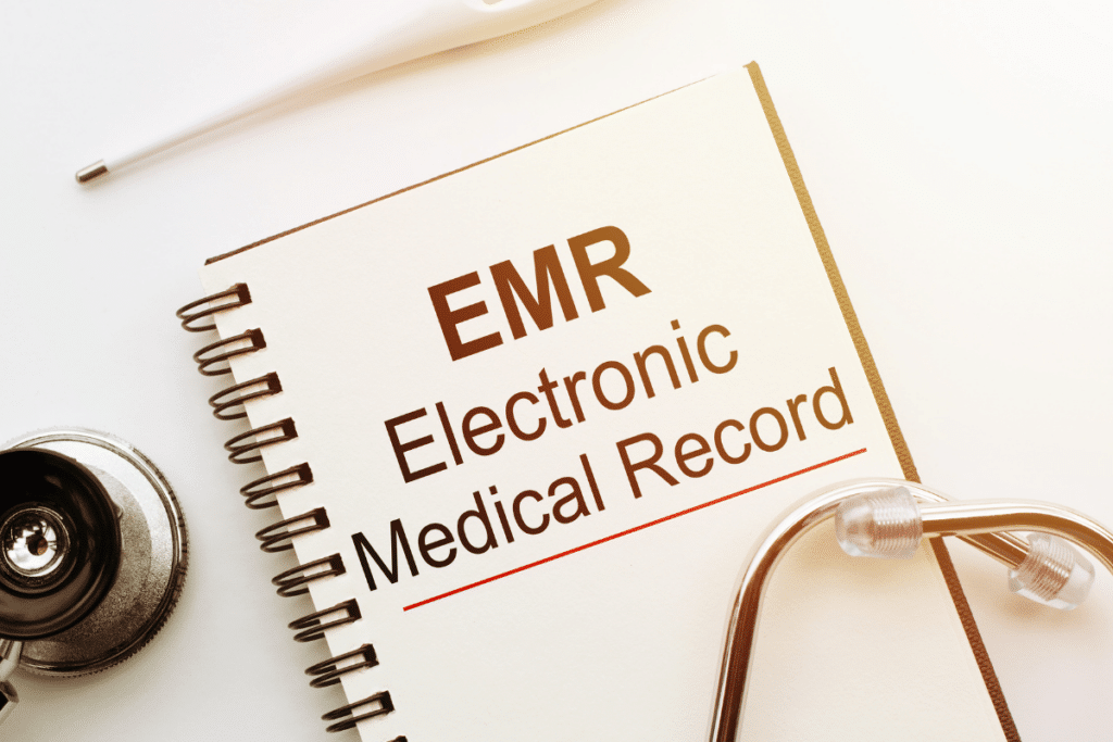 Image of an Electronic Medical Record (EMR) and a stethoscope.